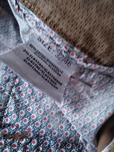 kozne pantalone hm: Muške chino pantalone, bež/kaki boje, ravnog užeg kroja. - Materijal — 6