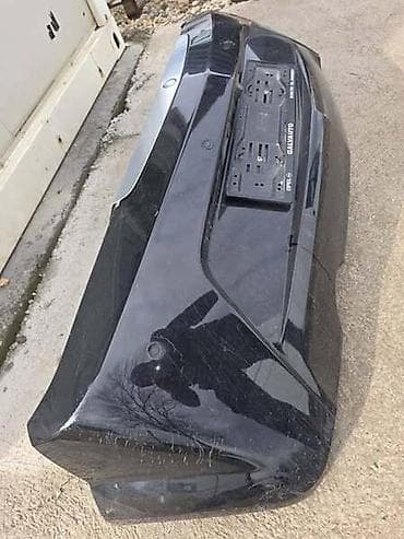 bobina cena: ZADNJI BRANIK BOJA-CRNA ZA OPEL TIGRA OD 2004. DO 2010. GOD. | — 2