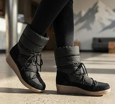Zimske ženske čizme u modernom „snow boot“ stilu, idealne za hladnije