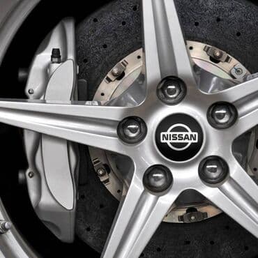20555 r16 felni: Čepovi za felne NISSAN - set 4 komada Čepovi za felne sa logom NISSAN — 3