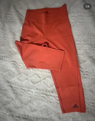 Adidas ženske sportske helanke, narandžaste boje. Model 3/4 dužine na lalafo.rs Adidas ženske sportske helanke, narandžaste boje. Model 3/4 dužine