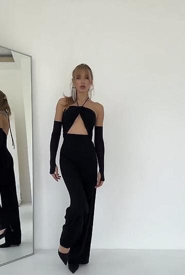 Elegantni ženski kombinezon bez naramenica sa halter vezivanjem oko