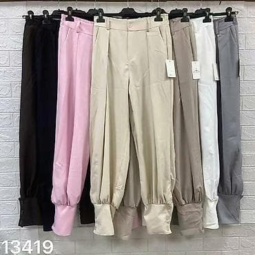 straus pantalone: Ženske elegantne pantalone sa spuštenim krojem i manžetnama - Model — 5