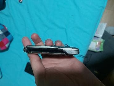 rerna na plin: Motorola v3i verzija sa ulazom zs micro sd karticu.koja dolazi sa njim — 5