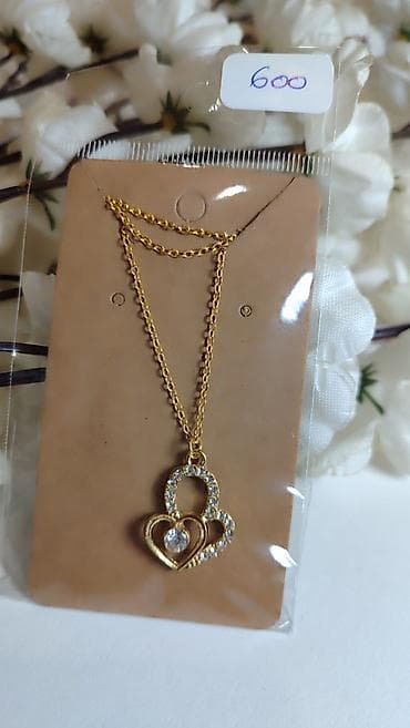 velicine naocara za sunce: Zlatno-tonirana ogrlica sa priveskom “Dva srca” - Lančić u zlatnoj — 1