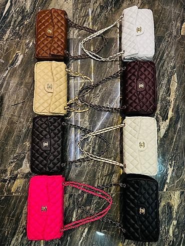 Ženske crossbody torbice – proštepani dizajn sa lancem - Model