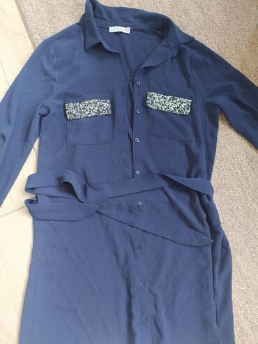 Kosulja 36 velicina teget boja na slici se vidi svetlije