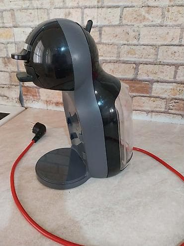 Aparat za DOLCE GUSTO kapsule je u odlicnom stanju sa veoma sitnim