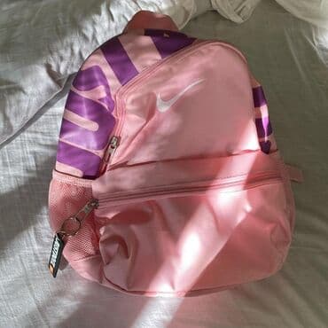 Muzički instrumenti: Nike ranac – roze/ljubičasti - Model sa belim Nike Swoosh logotipom i — 1