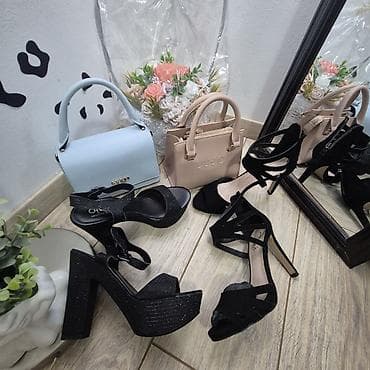 guess crne torbe: Ženska modna kombinacija – torbice i elegantne sandale sve su u broju — 1
