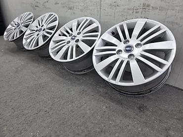 Car Parts & Accessories: ALUMINIJUMSKE FELNE FIAT GRANDE PUNTO 15 4 X 100 | Fiat Grande Punto — 4