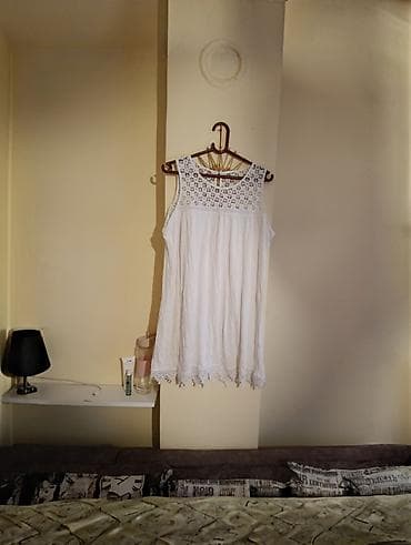 Bela letnja haljina bez rukava sa čipkom - Boja: bela - Model: ravna na lalafo.rs Bela letnja haljina bez rukava sa čipkom - Boja: bela - Model: ravna