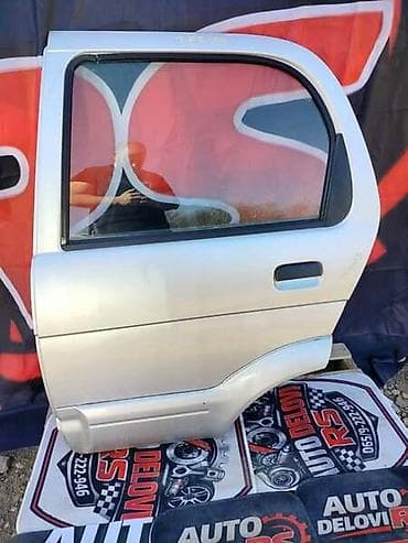 Karoserija: ZADNJA LEVA VRATA SIVA ZA DAIHATSU TERIOS OD 1997. DO 2006. GOD. | — 1
