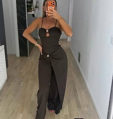 Kombinezon elegantni sa ukrasnim kopčama. - Model dugački kombinezon