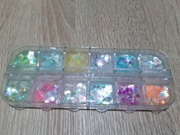 Nega noktiju: Mix set 12u1 za ukrasavanje nokta
Cena 350din — 1