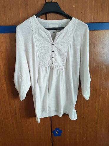 suknja trikotaza: Ženska bluzica H&M, bela, lagana i vazdušasta. - Model sa blagim — 1