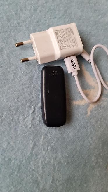 Car Electronics: L8STAR mini mobilni telefon + punjač Opis: - Ultra-kompaktan mobilni — 8