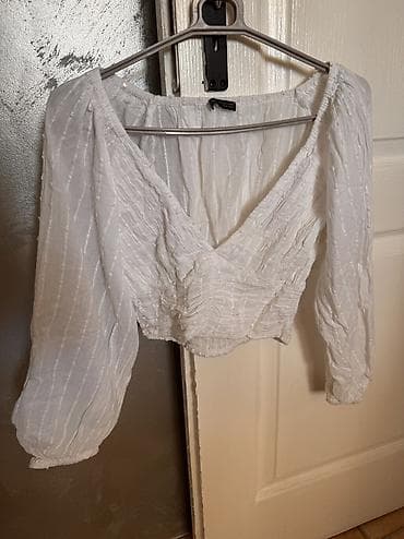 Muška odeća: Bela lagana bluzica top
Odgovara xs/s velicini — 1