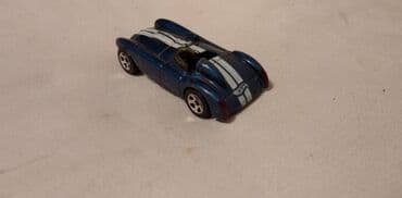 kinder joy harry potter figurice: Hot Wheels CUNNINGHAM c4r oko 1:55malo izgreban — 2