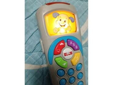 lutke za bebe devojcice: Fisher Price - daljinski sveznalica Puno različitih melodija, zvukova — 1