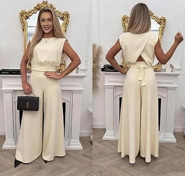 kompleti zenski: Elegantni ženski kombinezon sa širokim nogavicama - Kroj: bez rukava — 1