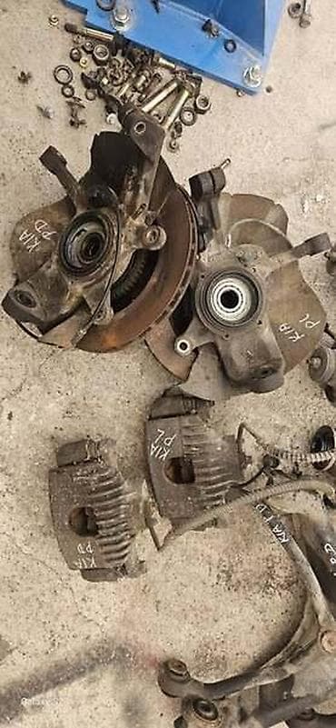 user car: POLUOSOVINA ZA KIA SPORTAGE ZA 2003. GOD — 2