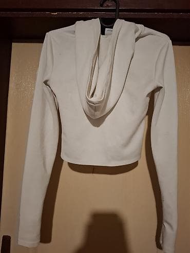 Ostalo: Kratka bela dukserica sa kapuljačom i rajsferšlusom - Model: ženska — 2