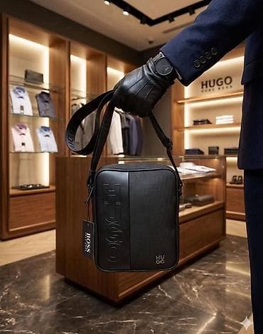 Muške crossbody torbe – premium brendovi Opis: - Elegantne muške