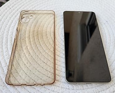 telefon na tipke: Samsung Galaxy A06 4/128 GB Samsung Galaxy A06 sa **4 GB RAM — 9