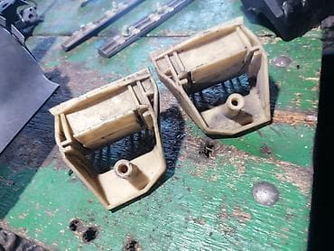 Plastični nosači/– BMW E39 - Originalni plastični nosači (mehanizam
