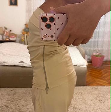 moderni zenski kompleti: Potpuno ocuvan komplet pantalone i top majica, kao nov. Pantalone su — 7