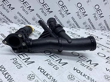 auto delovi loznica: TERMOSTAT SA RACVOM ZA VOLKSWAGEN TIGUAN, TOURAN, GOLF 7 . - 04L 121 — 4