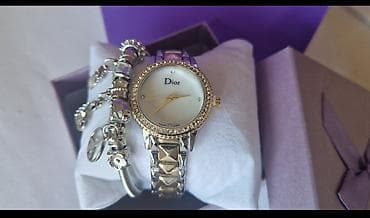 Elegantni ženski ručni sat Dior sa sjajnim detaljima. - Kućište