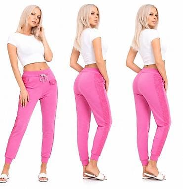 prljavo roza boja: Ženske trenerke – roze - Model: uski kroj sa elasticiranim manžetnama — 3