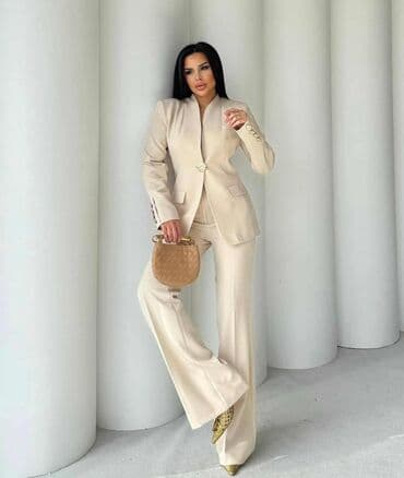 elegantni kompleti sa pantalonama: Elegantno žensko odelo u više boja, sa sakoom i pantalonama. Sako ima — 2