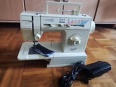 Dizalice: Povoljno prodajem korišćenu mašinu za šivenje marke Singer 4525C Style — 1