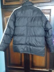 Zimska puffer jakna, muški/unisex model. nošeno ima pocepano vidi se na lalafo.rs Zimska puffer jakna, muški/unisex model. nošeno ima pocepano vidi se