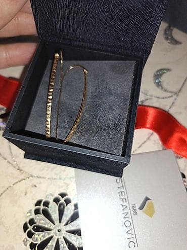 privesci od nerdjajuceg celika: Materijal: Zlato — 3