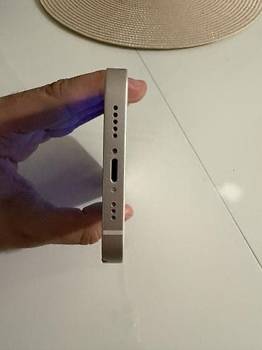 za igru: * iPhone 13 128 GB * Bela boja (White) * Battery Health: 75% * SIM — 2