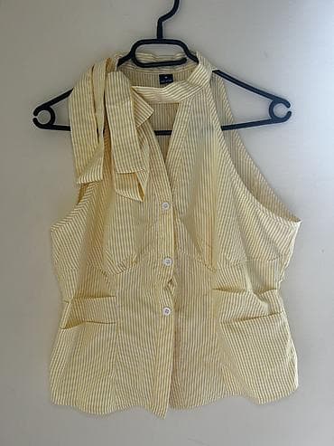 katrin kosulje: Ženska prugasta bluzica bez rukava sa mašnom na vratu - Model — 1