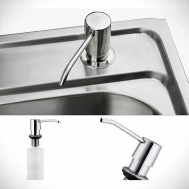 Dozator za sudoper siv na stolu sam slikala kako izgleda cena je 1500