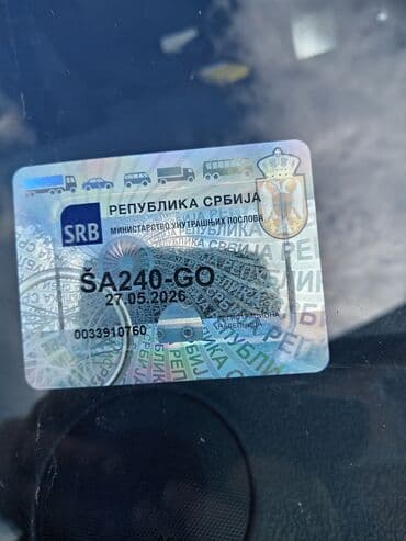 lidl presvlake za auto: Peugeot 407 SW karavan u crnoj boji. Vozilo ima krovne nosače i alu — 8