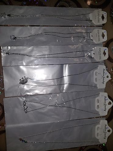 Set ogrlica od nerđajućeg čelika – više modela sa privescima - na lalafo.rs Set ogrlica od nerđajućeg čelika – više modela sa privescima -