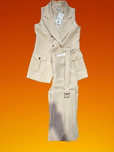 Bež dvodelni komplet – prsluk bez rukava i pantalone sa pojasom
36-42 na lalafo.rs Bež dvodelni komplet – prsluk bez rukava i pantalone sa pojasom
36-42