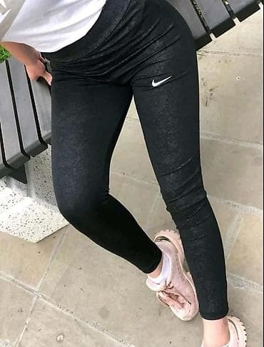 Helanke NIKE reljefne crne boja sa visokim strukom.Mokra likra