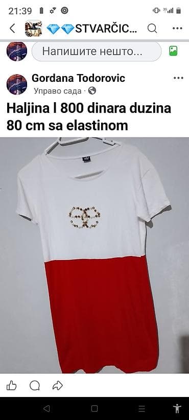 Haljina sa elastinom, dužina 80 cm. Dvodijelni izgled: gornji deo bele