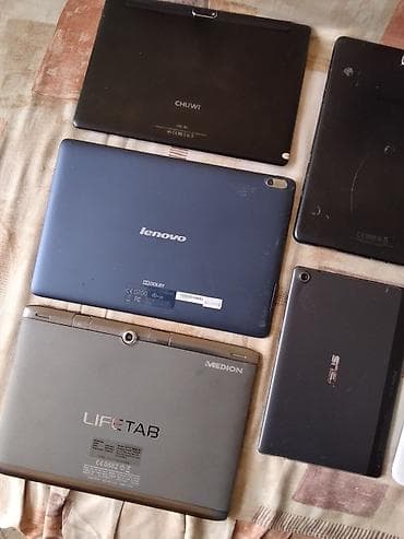 iphone 11 polovni cena: Lot tablet uređaja – više brendova i veličina ekrana. Na fotografijama — 9