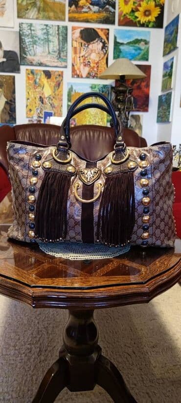 Ostali aksesoari: Gucci. Fantastična.

Bez ikakvih nedostataka.
45cm x 28cm x 10cm — 17