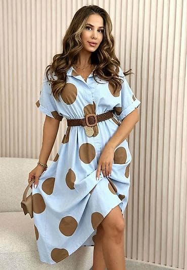 Haljina košulja sa krupnim tufnama - Kroj: ležeran A-kroj, midi