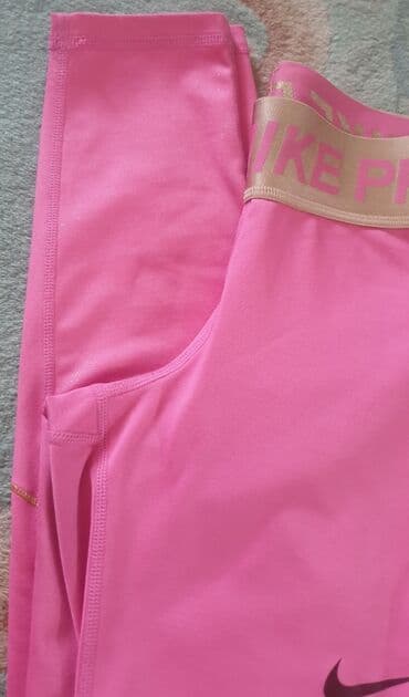 nike farmerke: NIKE pro dri fit original helanke roze boje sa zlatnom debelom gumom — 4